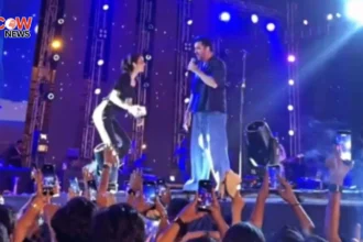 Fan Climbs Stage to Take Selfie with Atif Aslam in Karachi - The COW News