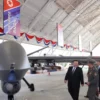 North Korea Showcases Advanced Drones, Kim Vows Military Expansion - The COW News
